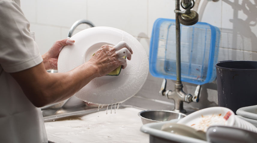 person-washing-dish